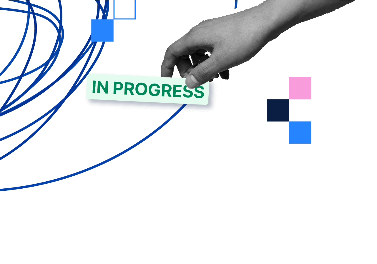 Immagine di una mano con la scritta "in progress"