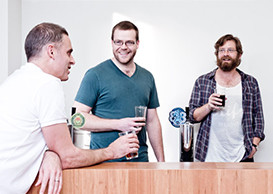 Employees having an after-work beer at Atlassian Sydney