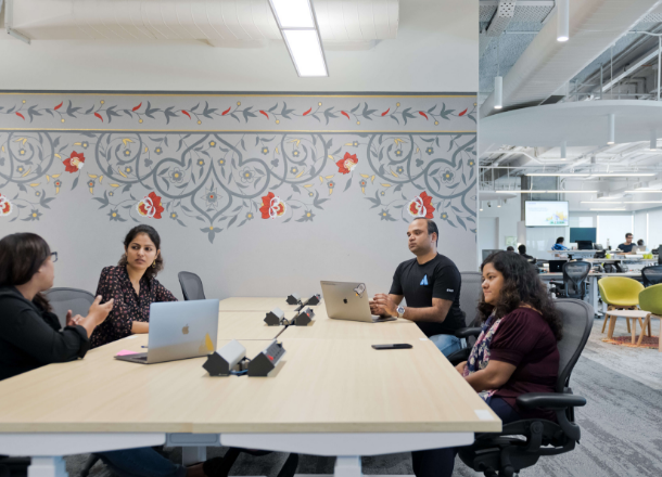 Four people at work in our Bengaluru office