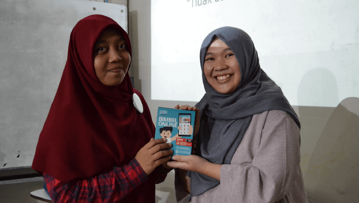 Two students attending Ruangguru’s Digital Bootcamp in Indonesia