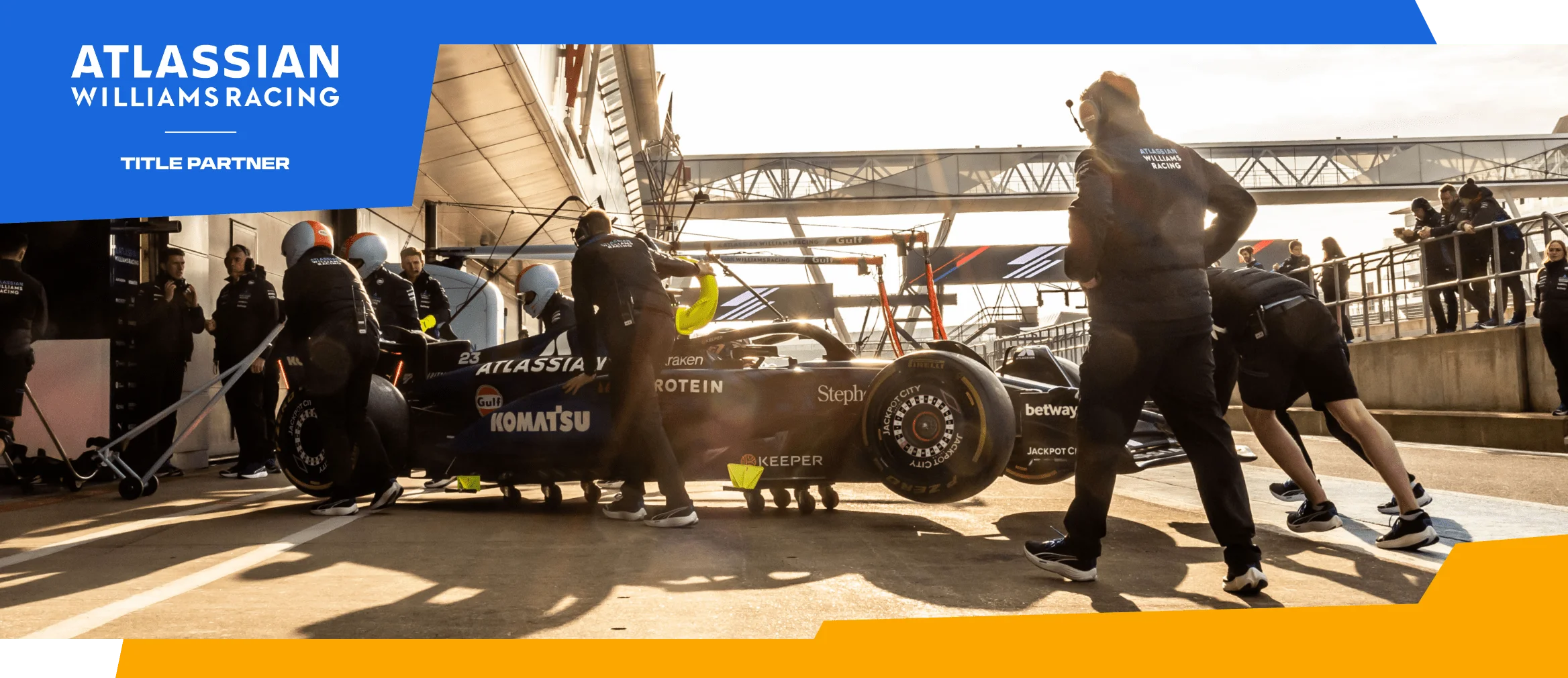 F1 pitstop with Atlassian Williams Racing partnership title.
